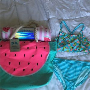 (2) BATHING SUITS (2) BEACH BAGS + (2) outfits